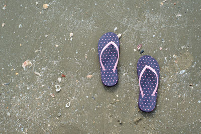 High angle view of black shoes on ground