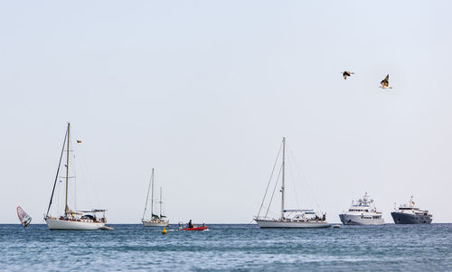 Boat sailing in sea