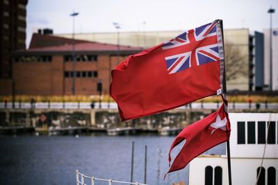 Flags against sky