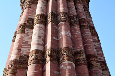 Low angle view of skyscraper against sky