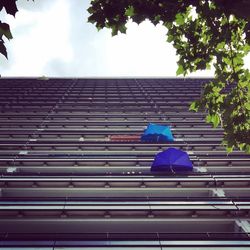 Low angle view of building against blue sky