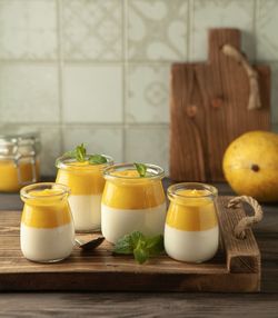 Jars of mango panna cotta on the table 