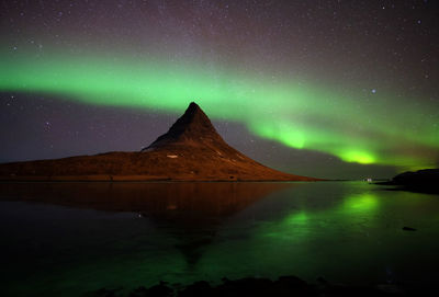 Scenic view of lake at night