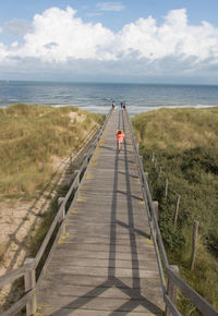 Wooden pontoon giving access to the sea and summer holidays