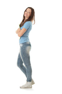 Portrait of a smiling young woman against white background