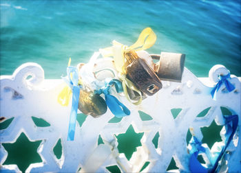 High angle view of paper with blue water