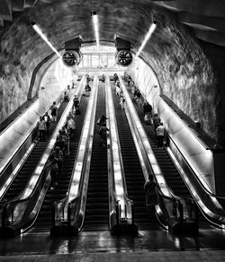 Low angle view of people at subway station