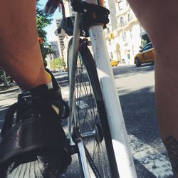 Cropped image of people on road