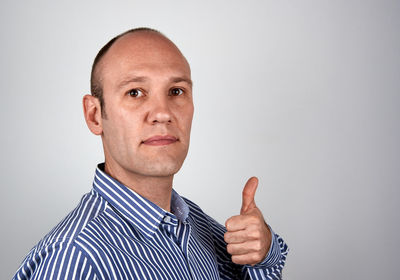 Portrait of man against white background