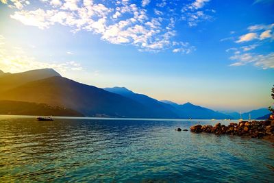 Scenic view of lake against sky during sunset