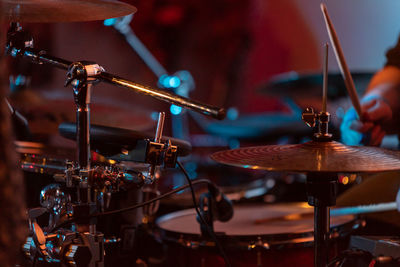 Close-up of drum and cymbal on stage