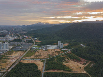 High angle view of cityscape against sky during sunset