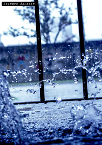 Close-up of raindrops on snow