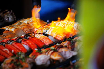 Close-up of meat on barbecue grill