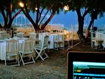 Empty chairs and tables at restaurant