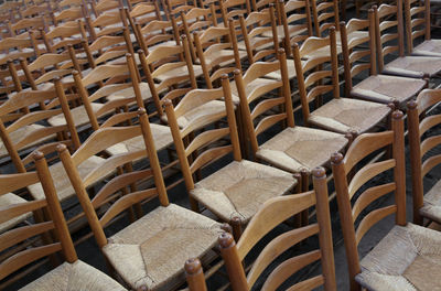 High angle view of empty chairs in row