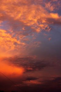 Low angle view of dramatic sky during sunset