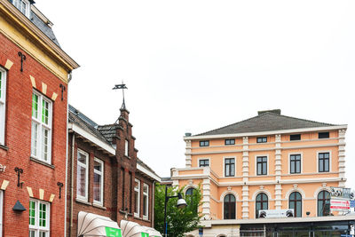 Low angle view of buildings against sky