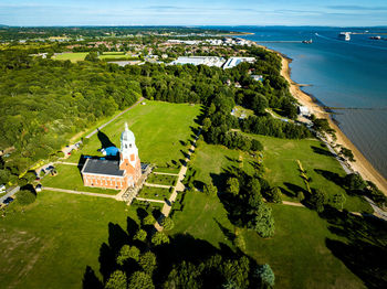 High angle view of townscape by sea