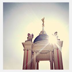 Low angle view of statue against sky