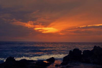 Scenic view of sea against sky during sunset