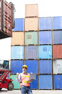 Portrait of man standing on pier