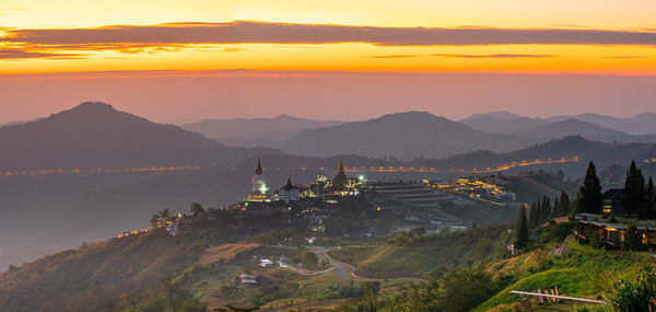 Scenic view of mountains against sky during sunrise over the mountains