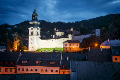 View of the old castle over the rooftops of banska stiavnica.