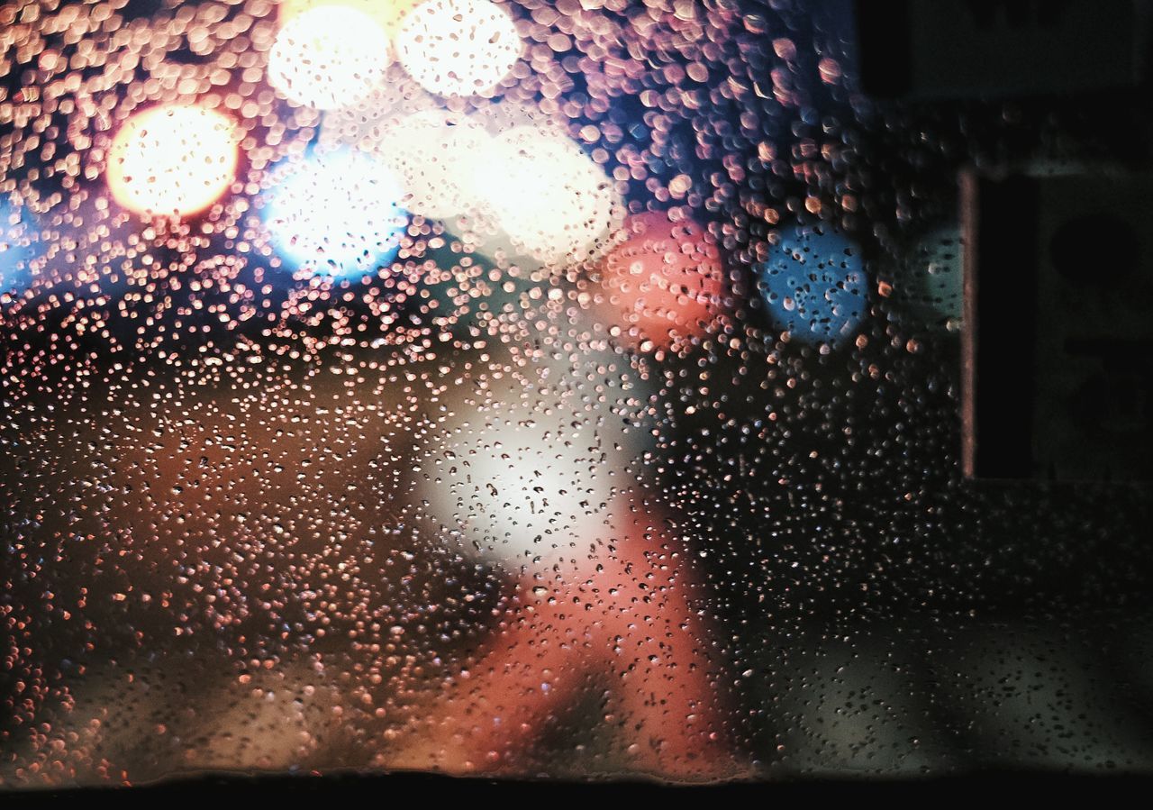 CLOSE-UP OF WET WINDOW