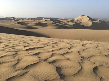 Scenic view of desert against sky