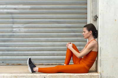 Active woman resting after running and exercise.
