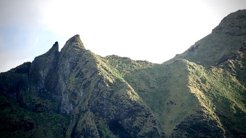 Panoramic view of mountain range against clear sky