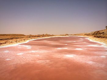Scenic view of landscape against sky during sunset
