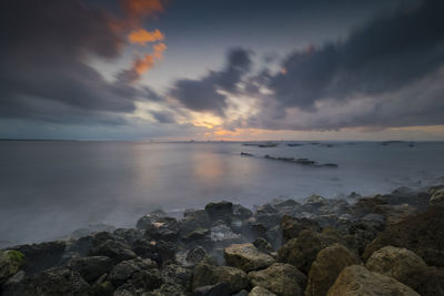 Scenic view of sea against sky during sunset