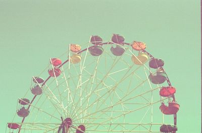 Low angle view of parasol against sky