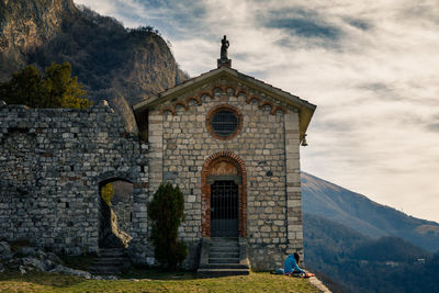 Facade of historic building against sky