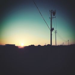 Low angle view of electricity pylon