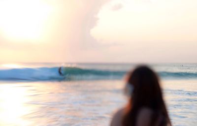 Scenic view of sea at sunset