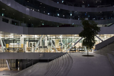 Illuminated modern building in city at night