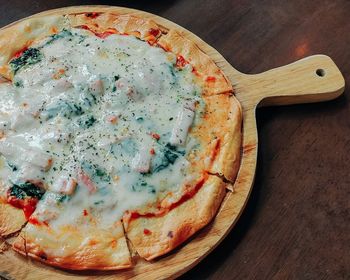 High angle view of pizza on table