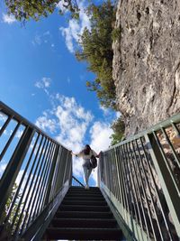 Girl walking up on bridge 