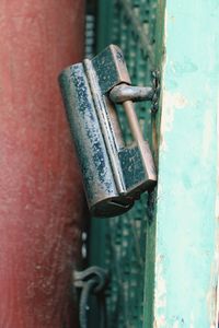 Close-up of padlock on door