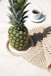 Fruits and coffee on table