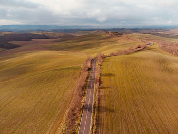 Scenic view of agricultural landscape against sky