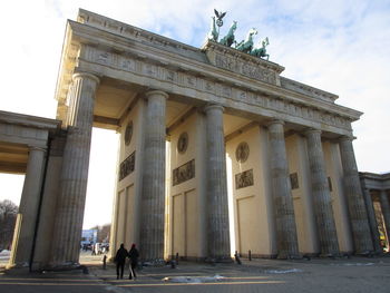 Tourists in front of historical building