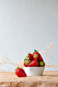 Close-up of strawberries on table