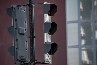 Close-up of electric fan against wall