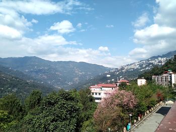 High angle view of buildings in city against sky