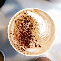 High angle view of cappuccino on table