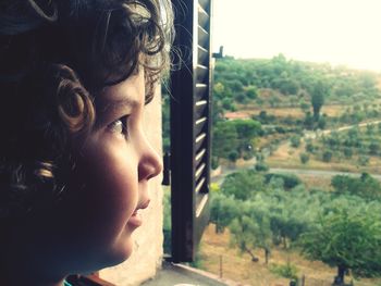 Portrait of cute girl looking away